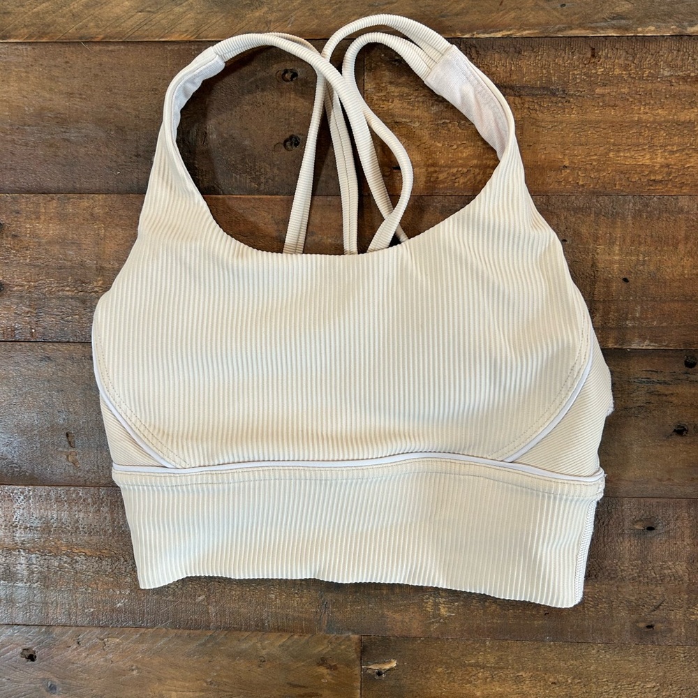 Lululemon cream sports bra/cropped top size 2. Used but in good Condition.